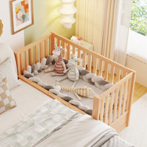 Cot with outlet side drawers